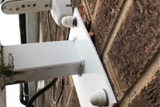 Awning stand off bracket pulling out of brick Awning stand off bracket pulling out of brick